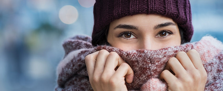 Woman feeling cold in winter