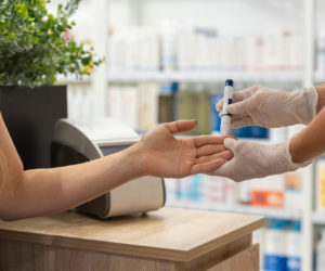 woman having a test in a pharmacy